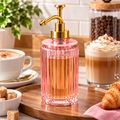 Distributeur de sirop rose en verre avec pompe